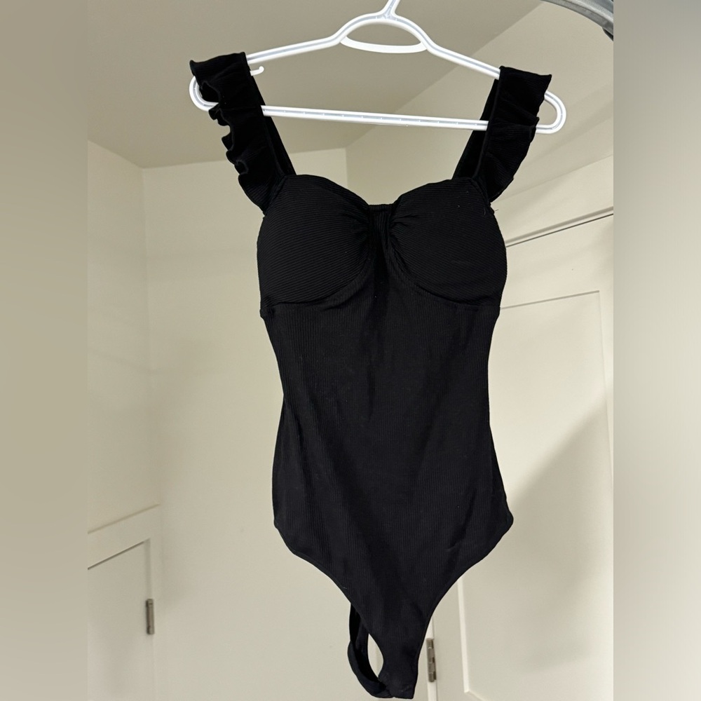 Black ruffled bodysuit